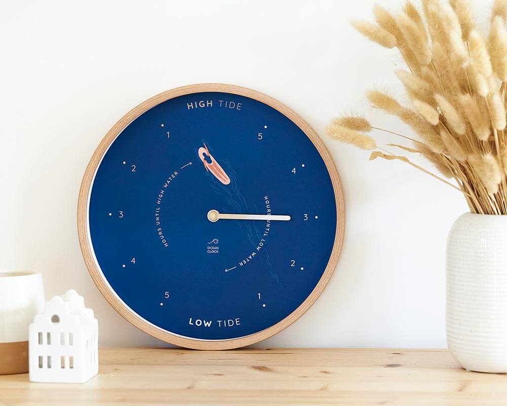 blue tide clock with surfer girl